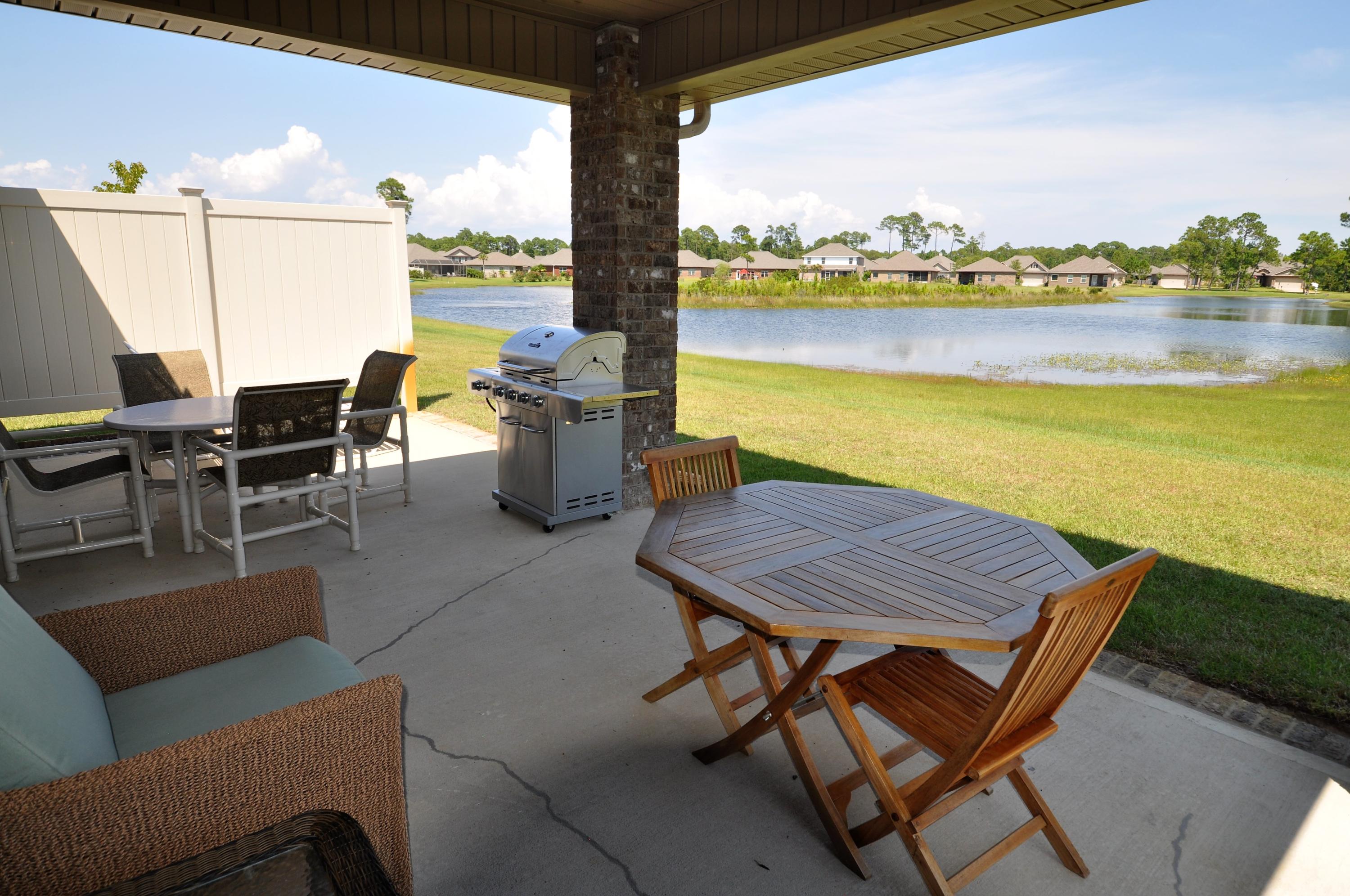 281 Pin Oak Loop Santa Rosa Beach, FL 32459 - Photo 19 of 21 a view of a terrace with furniture