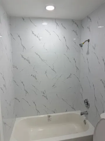 a bathroom with a bathtub