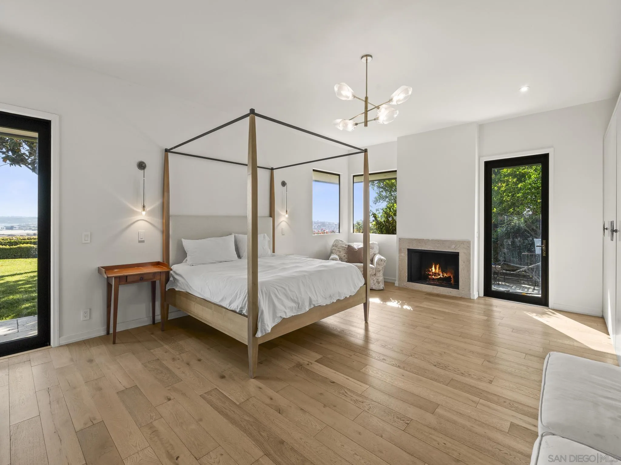 2323 San Juan Road San Diego, CA 92103 - Photo 25 of 47 a bedroom with a bed and a fireplace