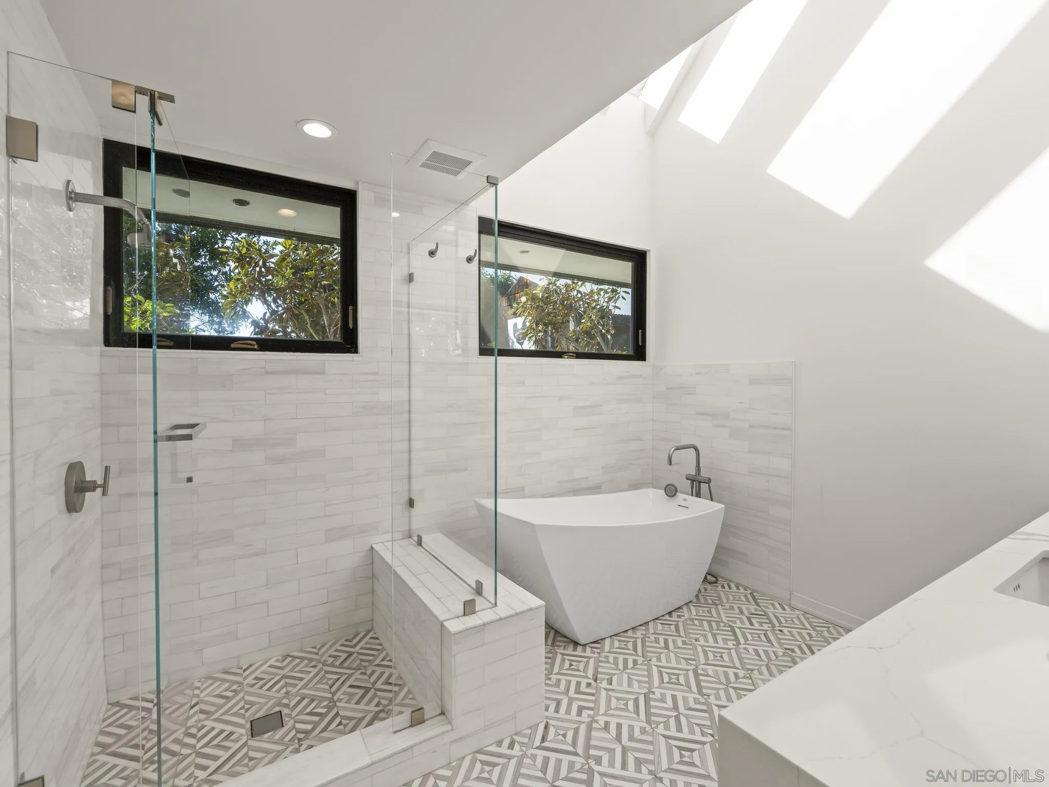 2323 San Juan Road San Diego, CA 92103 - Photo 26 of 47 a bathroom with a toilet a sink and bathtub
