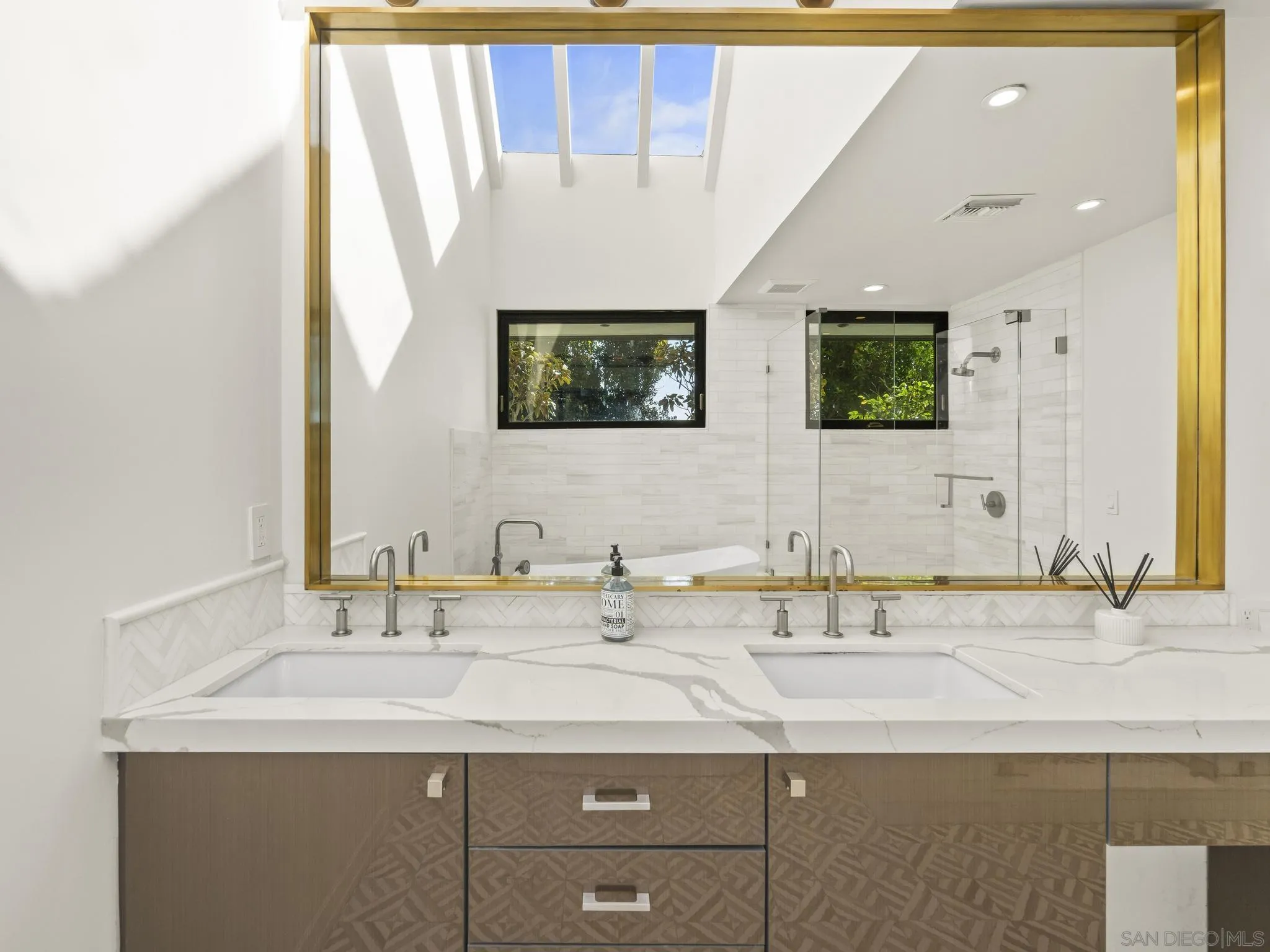 2323 San Juan Road San Diego, CA 92103 - Photo 28 of 47 a bathroom with a sink and a mirror
