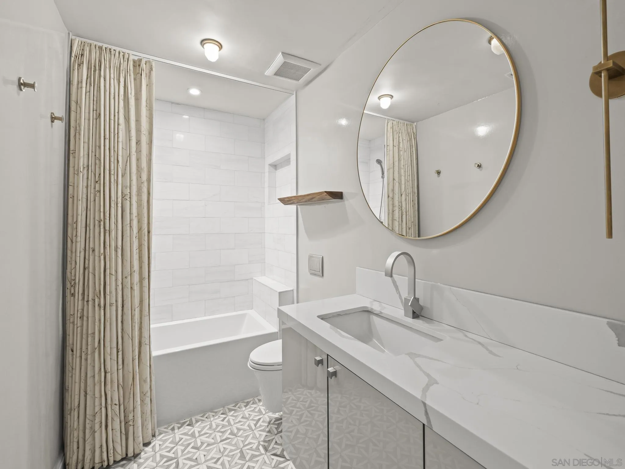 2323 San Juan Road San Diego, CA 92103 - Photo 32 of 47 a bathroom with a sink a toilet and shower