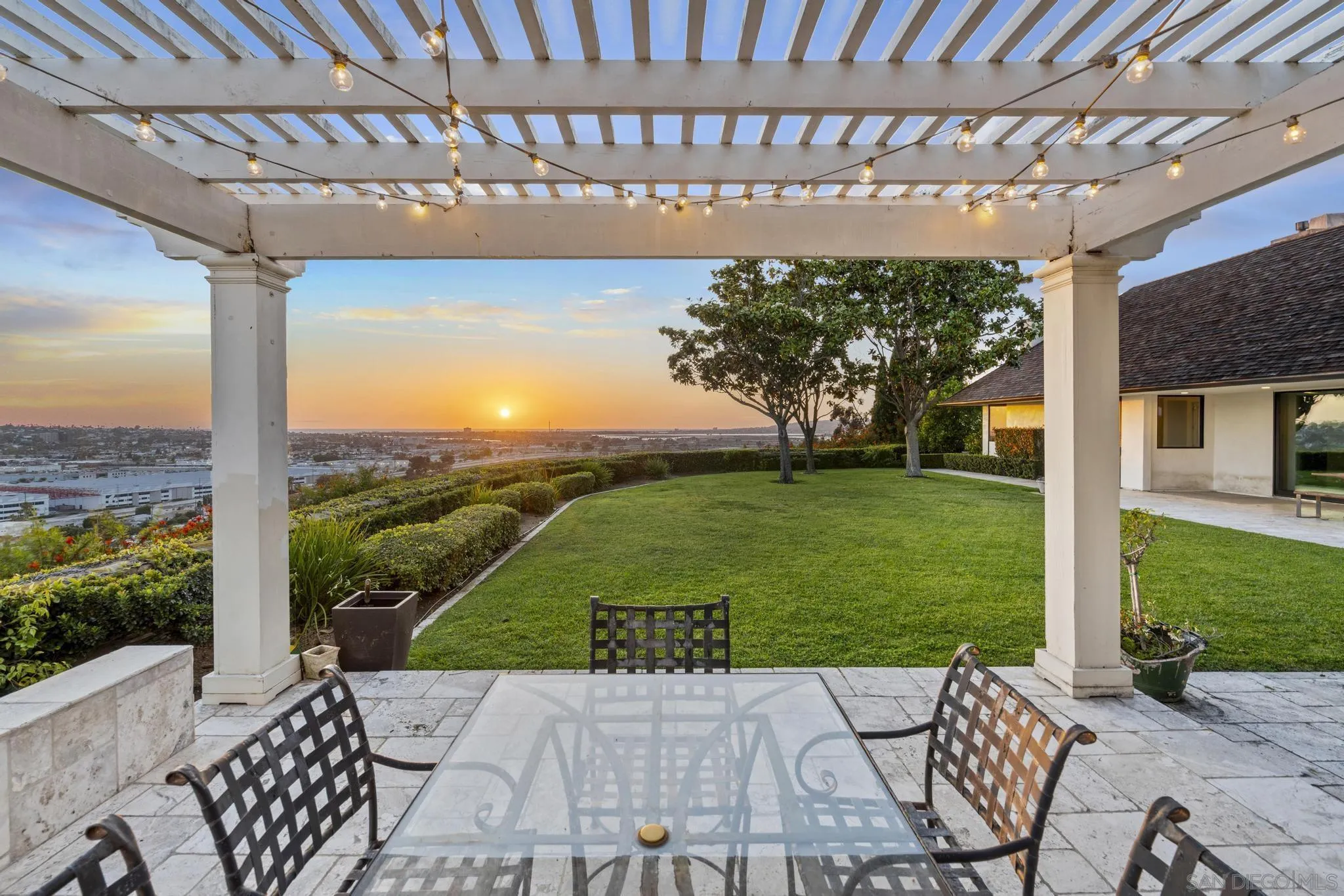 2323 San Juan Road San Diego, CA 92103 - Photo 37 of 47 a view of a patio with a table and chairs