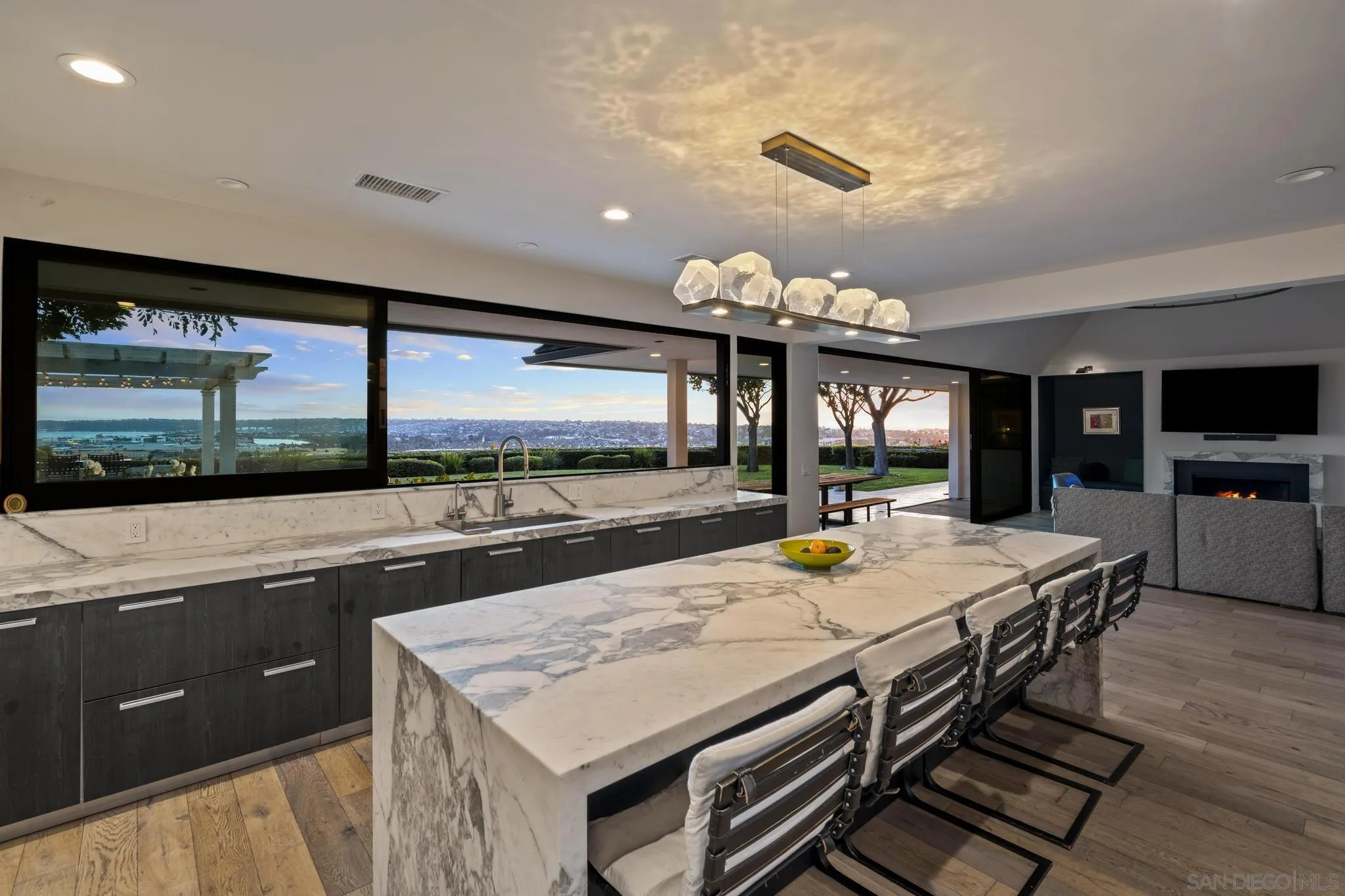 2323 San Juan Road San Diego, CA 92103 - Photo 10 of 47 a view of a dining room with furniture and a large window