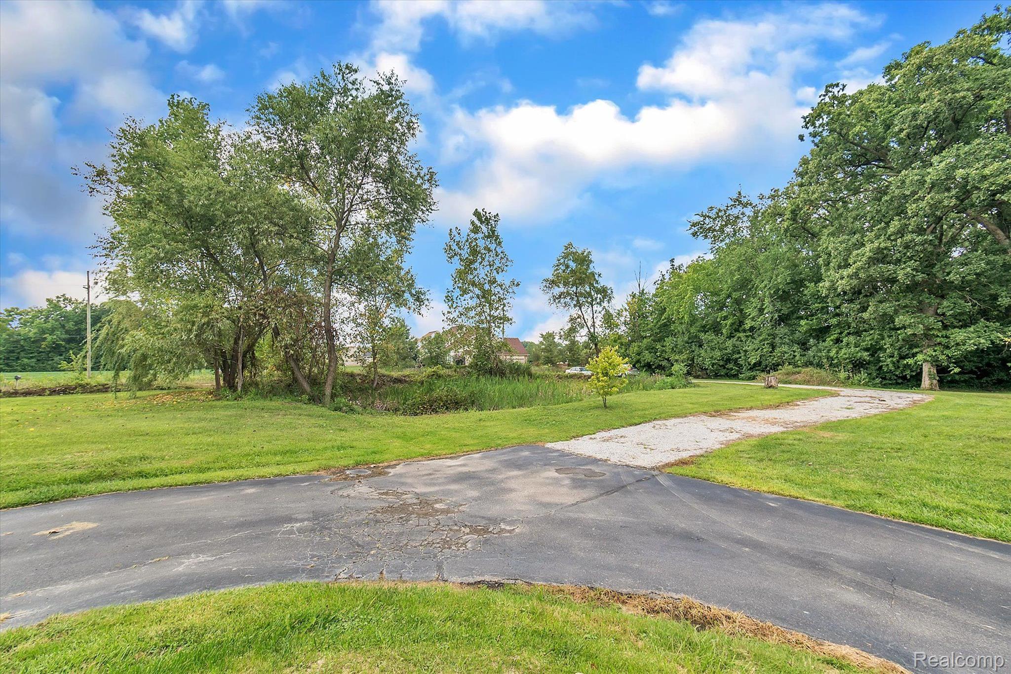 9055 Morton Taylor Road Belleville, MI 48111 - Photo 6 of 55 FRONT YARD/DRIVEWAY