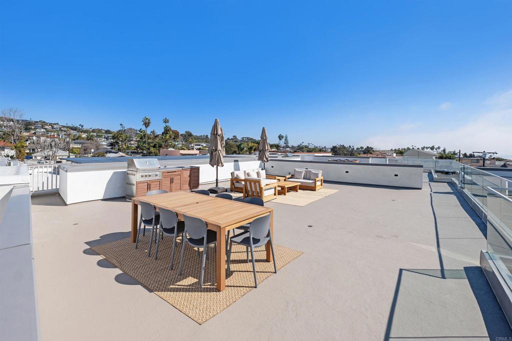 5656 La Jolla Boulevard, Unit 3 La Jolla, CA 92037 - Photo 24 of 35 a view of a terrace with sitting area