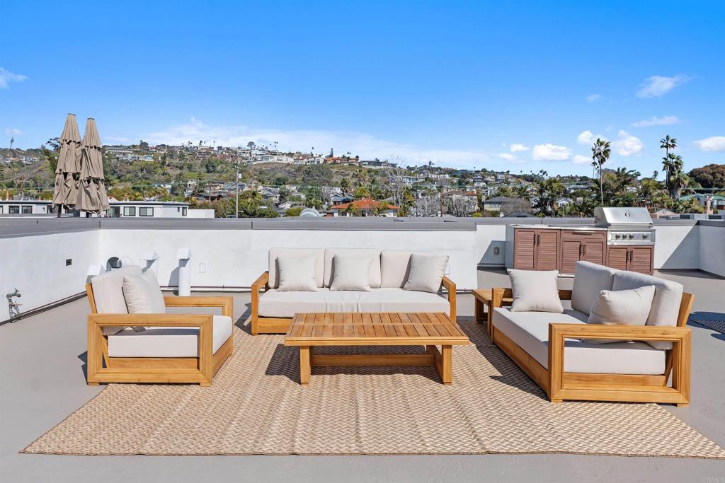 5656 La Jolla Boulevard, Unit 3 La Jolla, CA 92037 - Photo 25 of 35 a terrace of outdoor space with seating