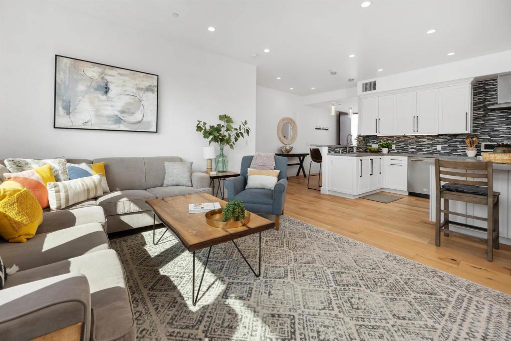 5656 La Jolla Boulevard, Unit 3 La Jolla, CA 92037 - Photo 9 of 35 a living room with furniture and kitchen view