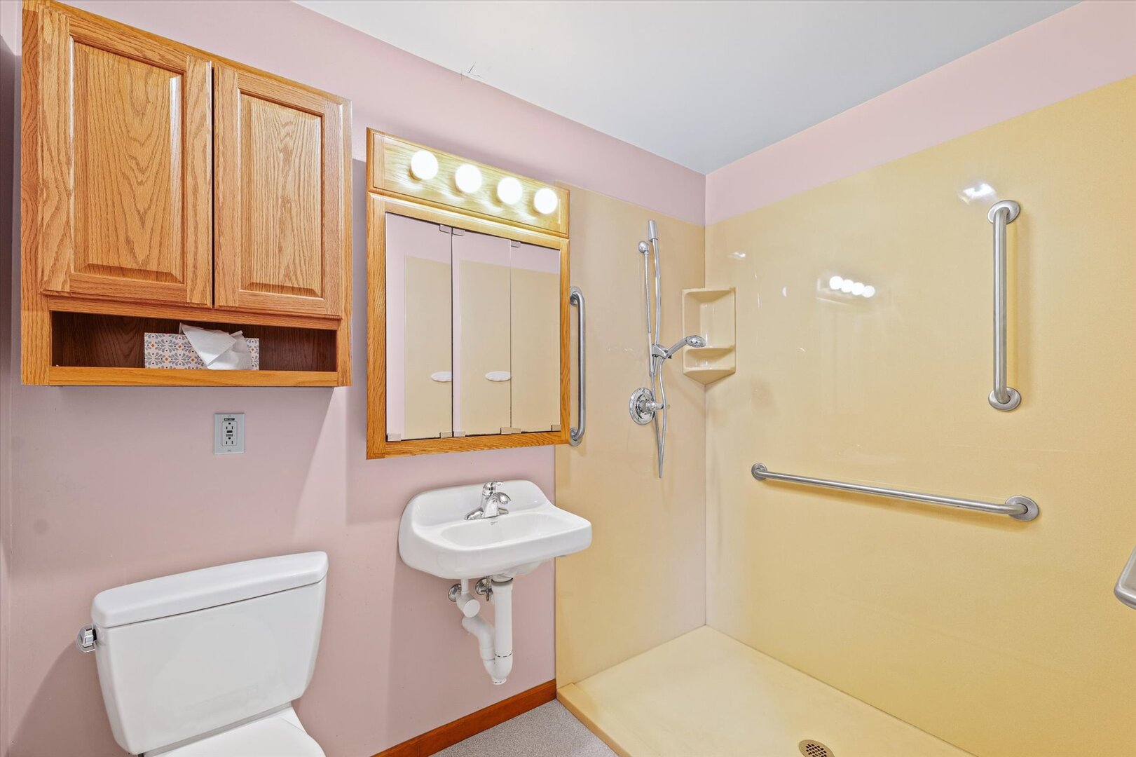 1706 Chevy Chase Drive Champaign, IL 61821 - Photo 13 of 29 a bathroom with a sink a toilet and shower