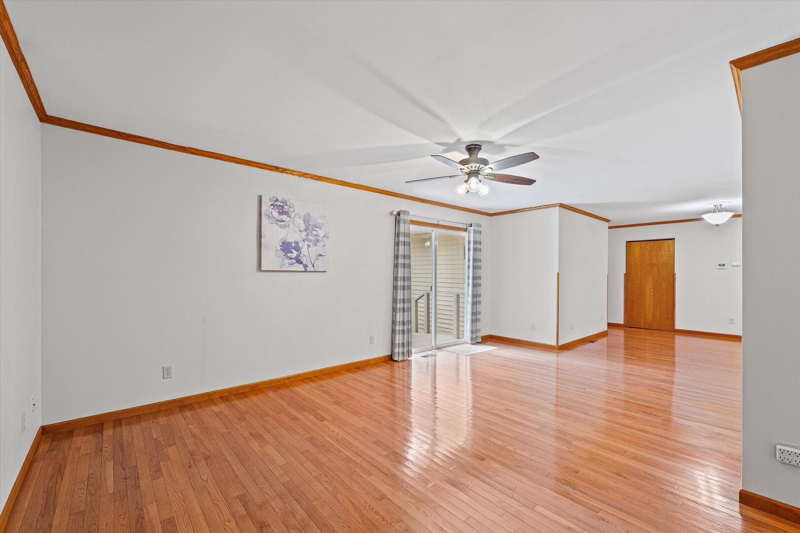 1706 Chevy Chase Drive Champaign, IL 61821 - Photo 16 of 29 a view of an empty room with wooden floor