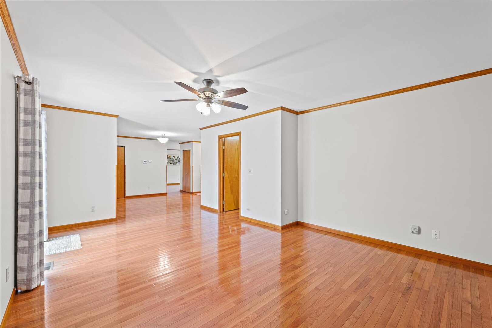 1706 Chevy Chase Drive Champaign, IL 61821 - Photo 17 of 29 a view of an empty room with wooden floor