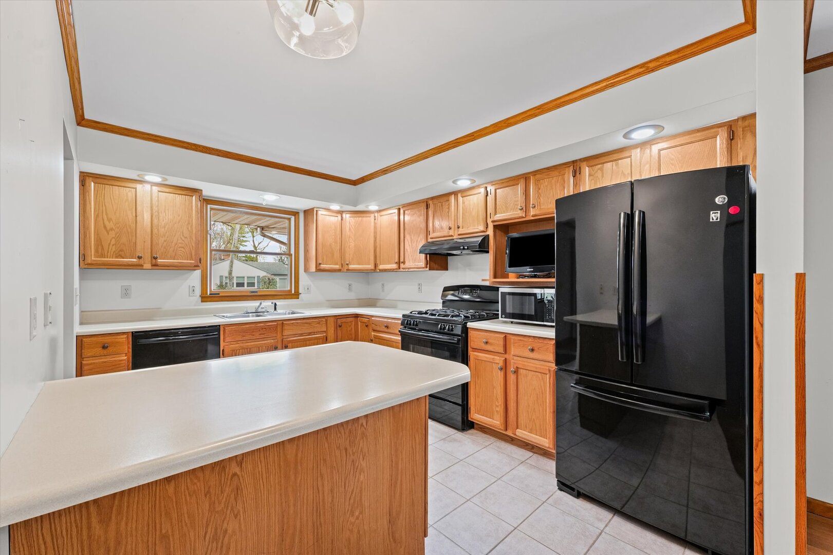 1706 Chevy Chase Drive Champaign, IL 61821 - Photo 24 of 29 a kitchen with stainless steel appliances granite countertop a refrigerator a stove and a sink
