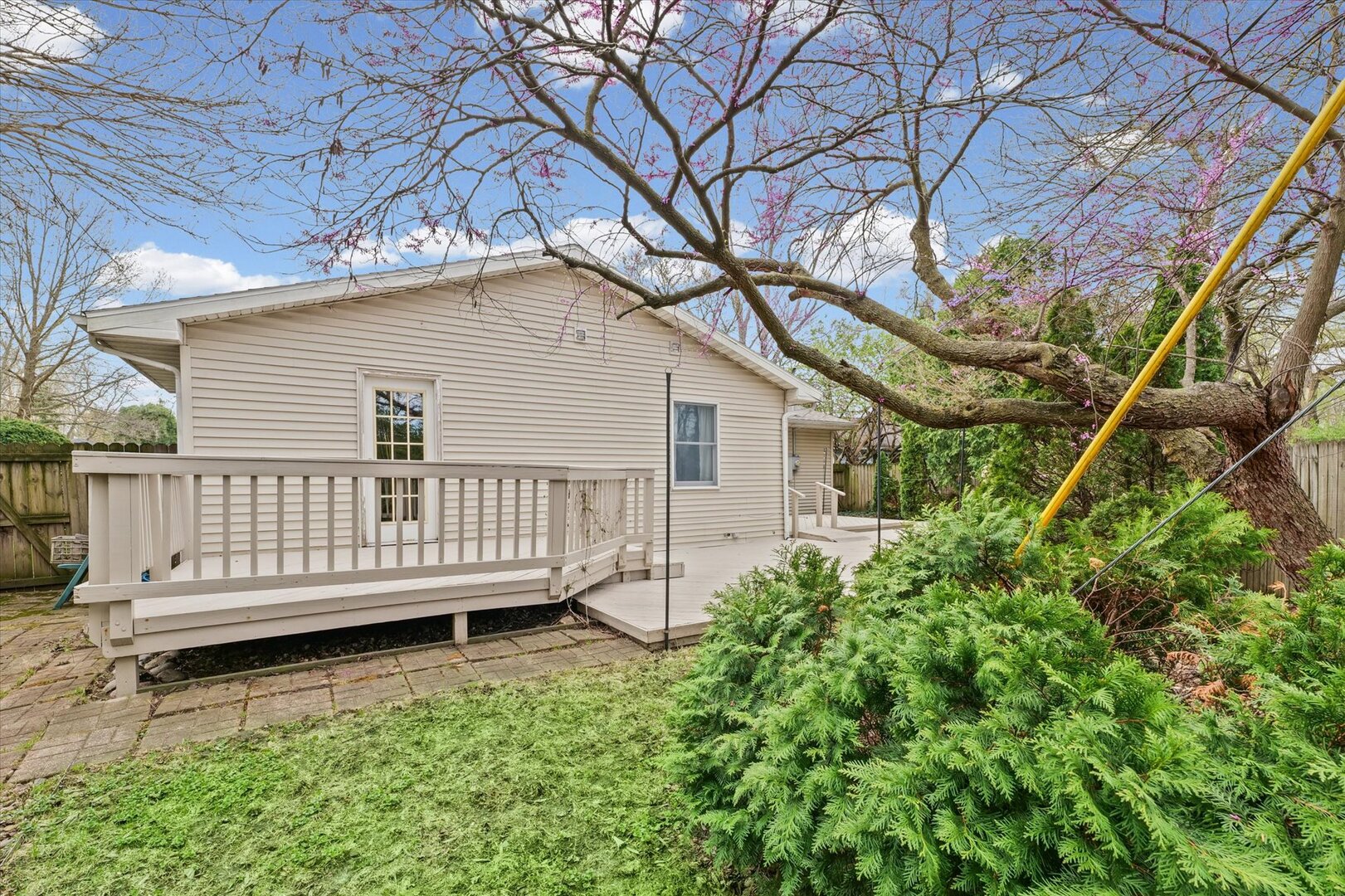 1706 Chevy Chase Drive Champaign, IL 61821 - Photo 3 of 29 a view of a yard with a deck