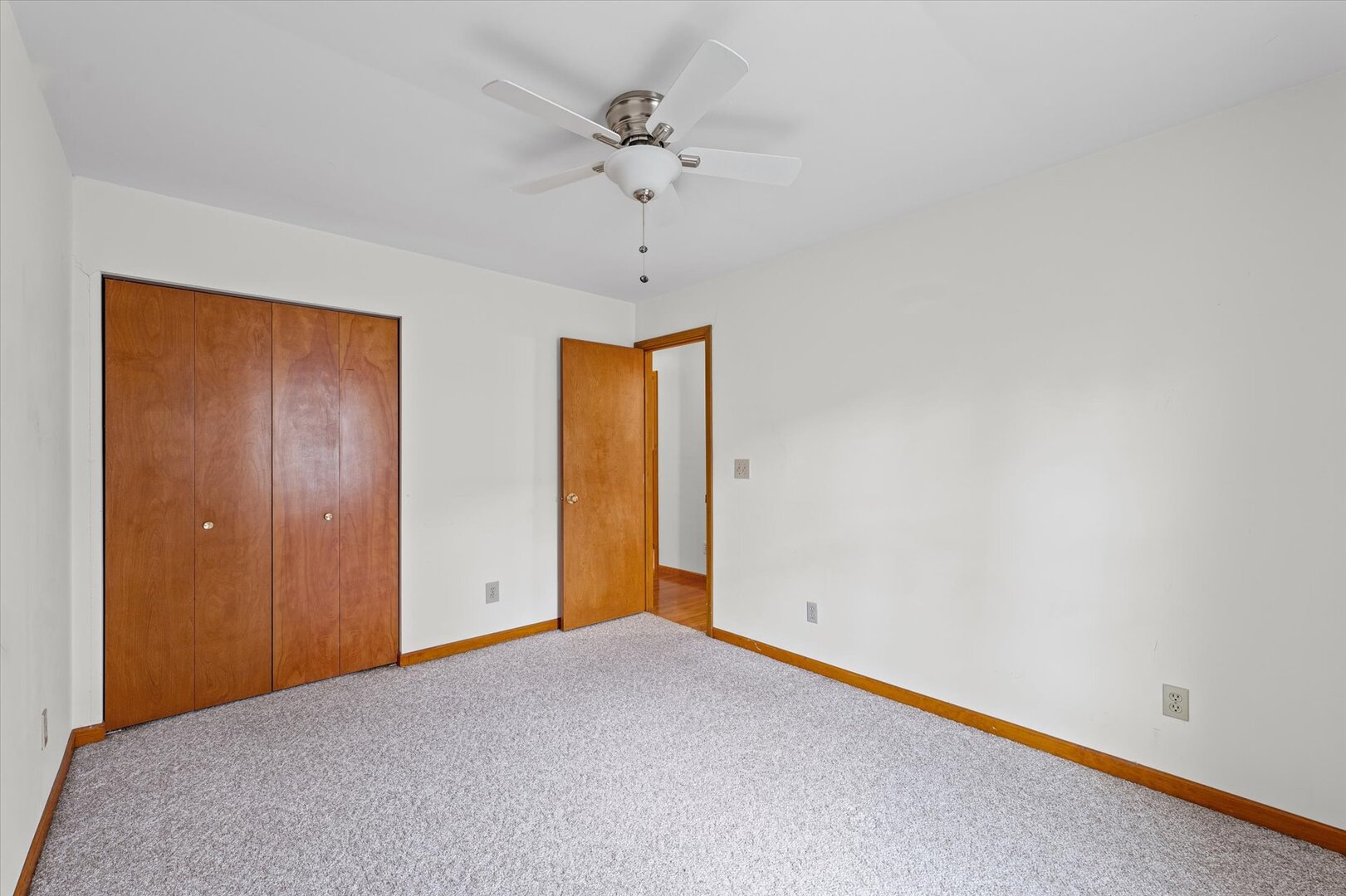1706 Chevy Chase Drive Champaign, IL 61821 - Photo 9 of 29 a view of an empty room with a ceiling fan
