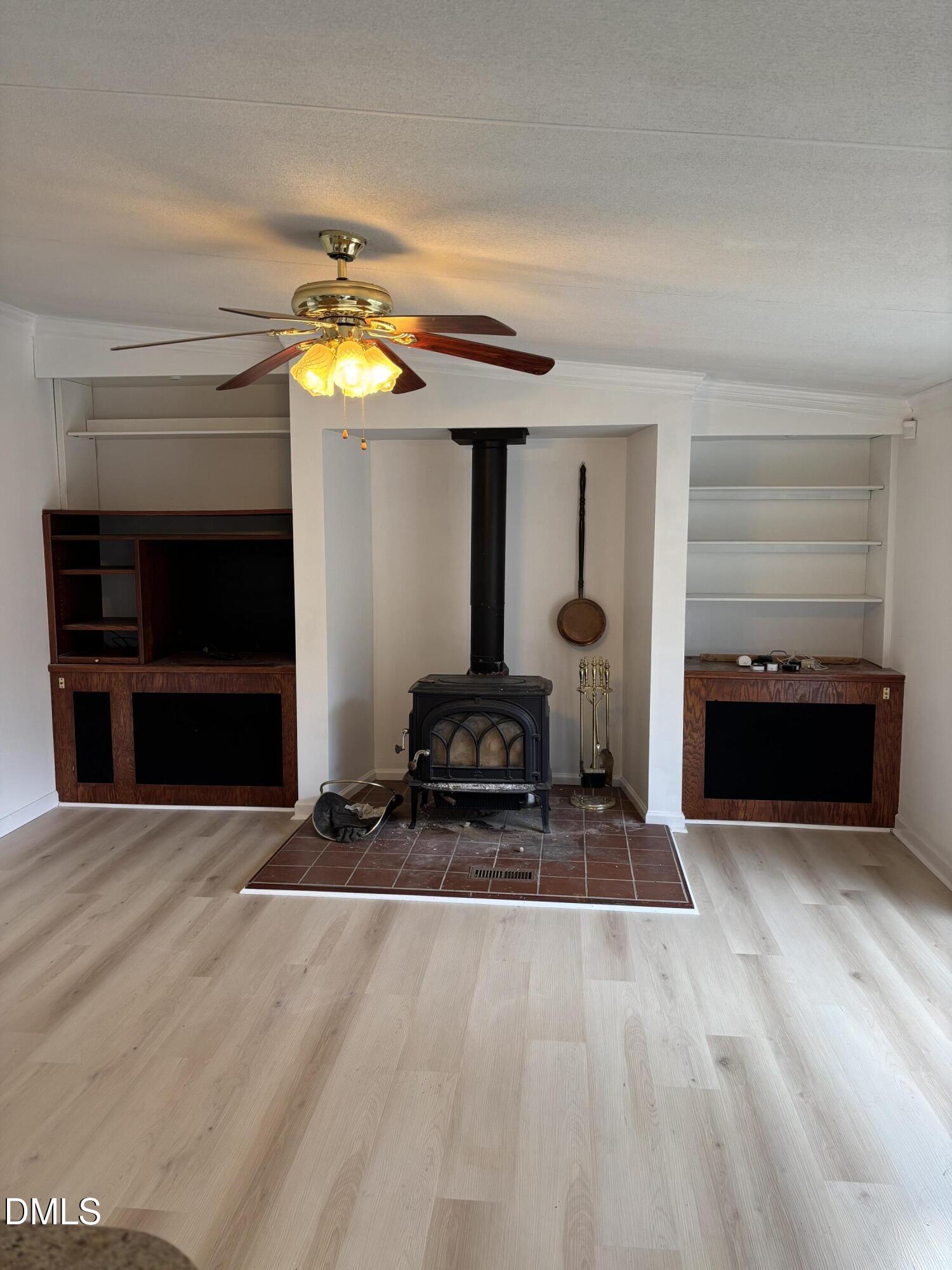 762 Shocco Springs Road Warrenton, NC 27589 - Photo 15 of 24 a living room with furniture and a fireplace