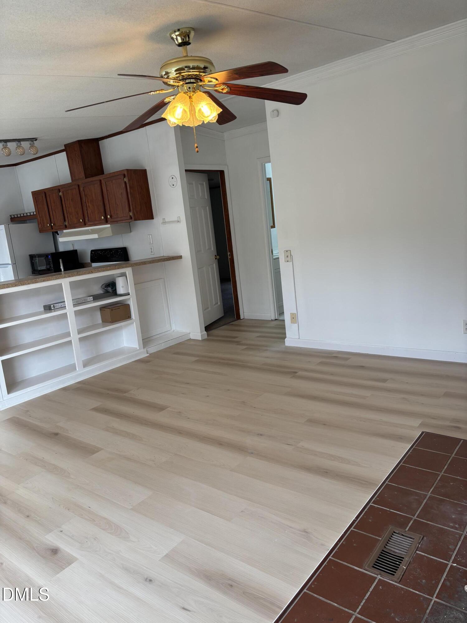 762 Shocco Springs Road Warrenton, NC 27589 - Photo 16 of 24 a room with furniture and a flat screen tv