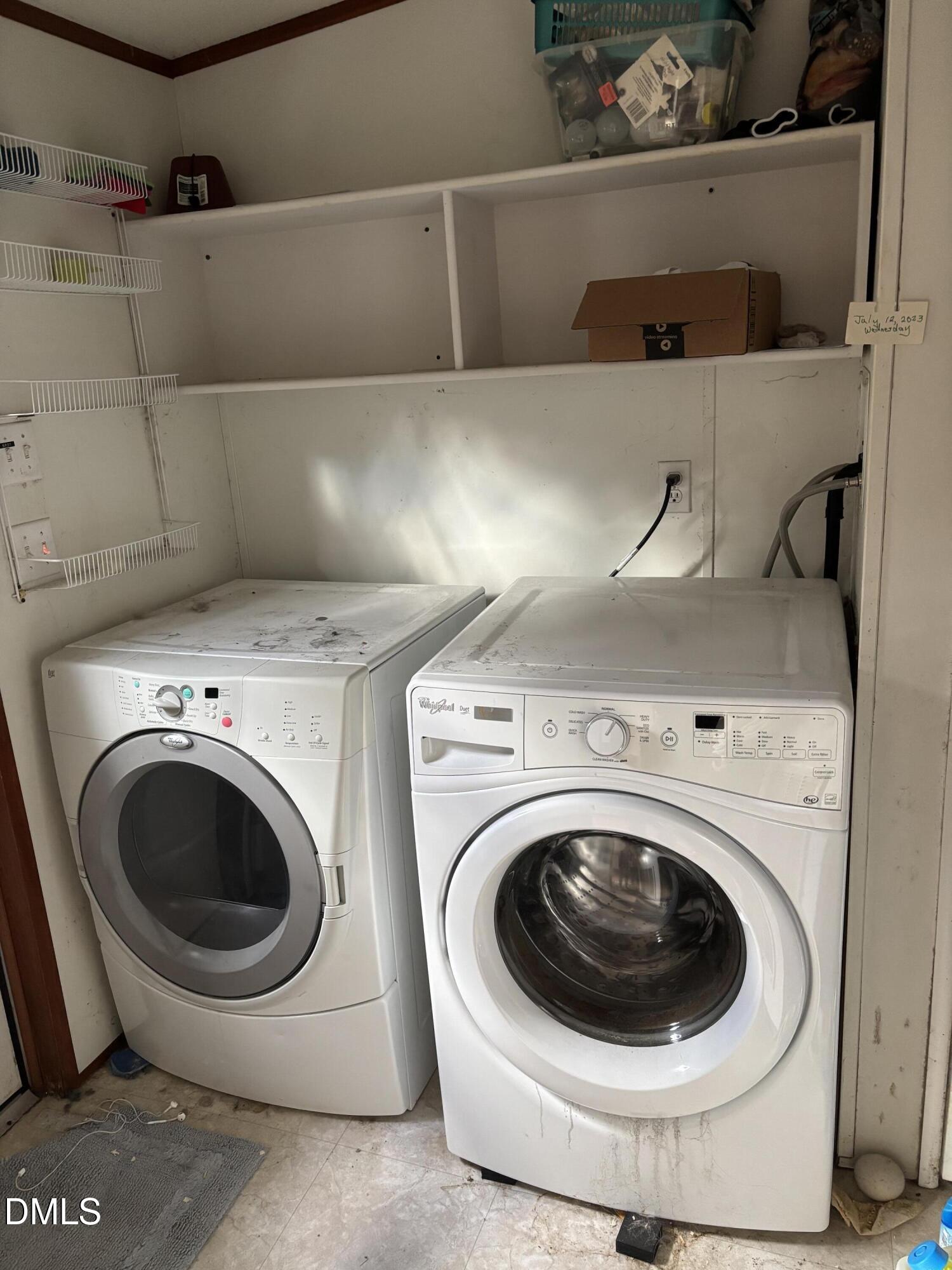 762 Shocco Springs Road Warrenton, NC 27589 - Photo 20 of 24 a utility room with dryer and washer