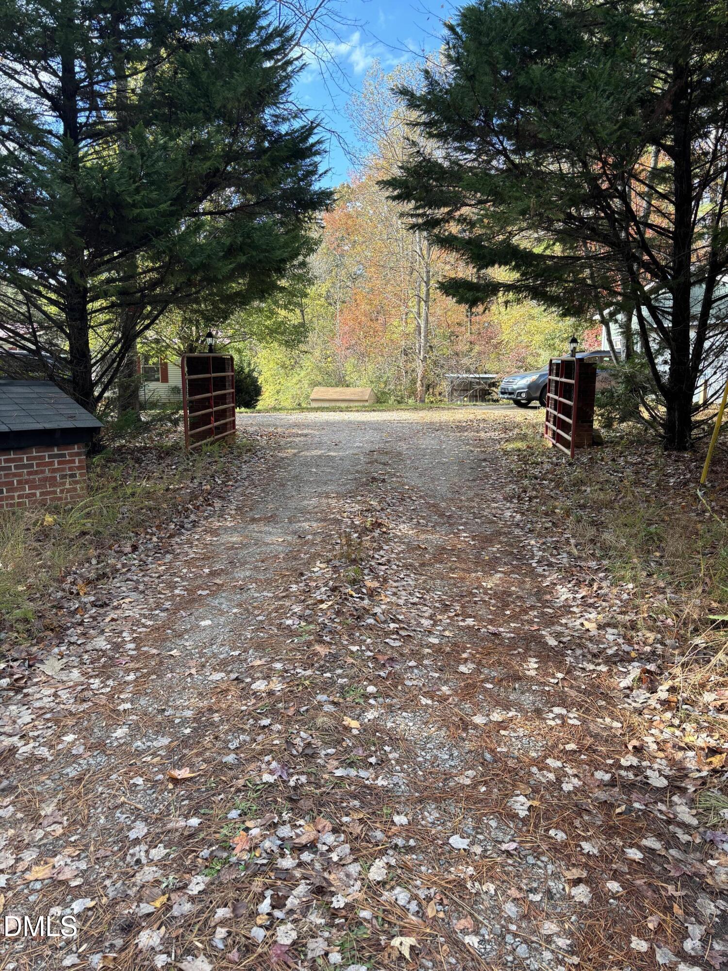 762 Shocco Springs Road Warrenton, NC 27589 - Photo 2 of 24 a view of road with trees