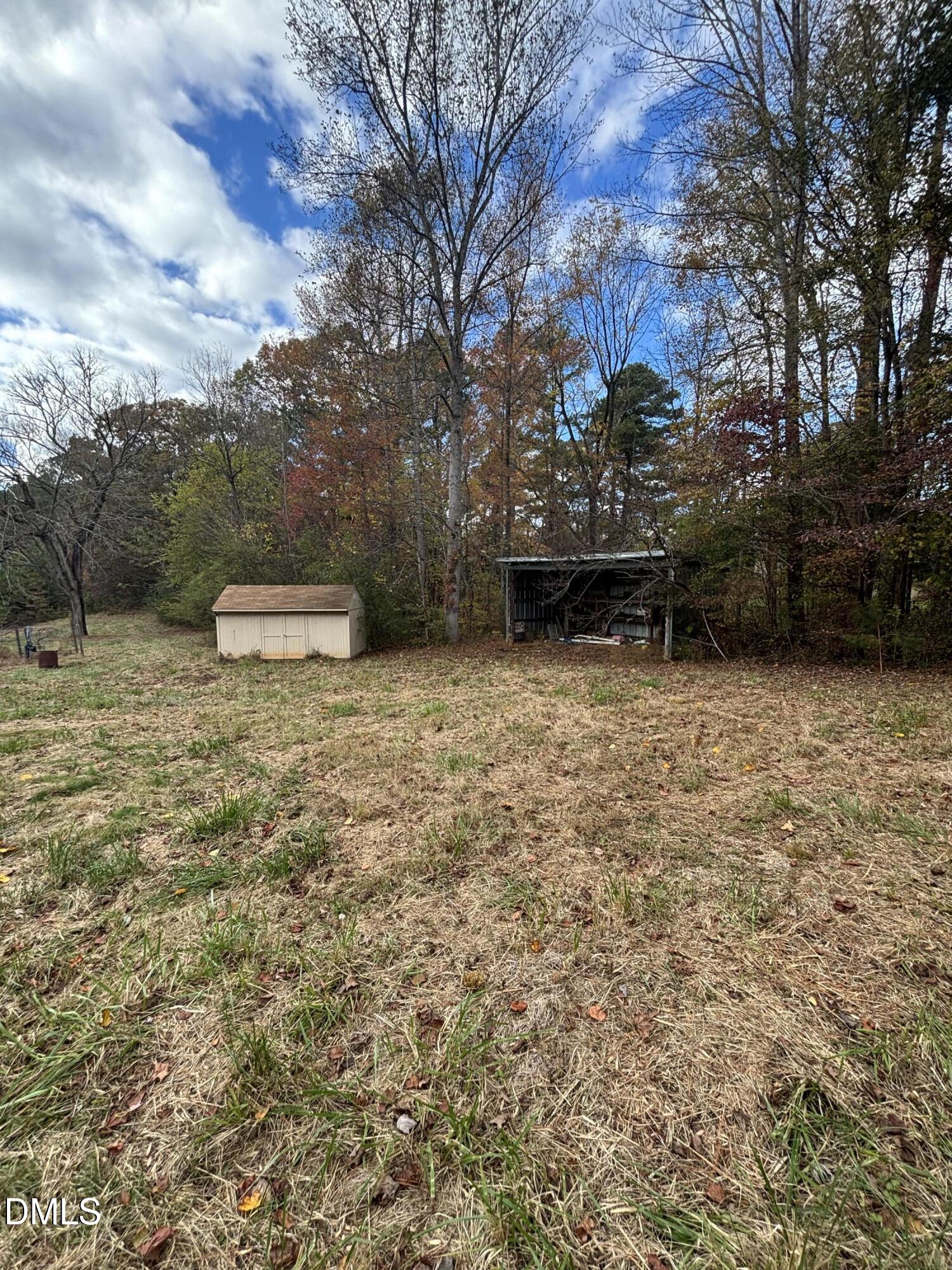 762 Shocco Springs Road Warrenton, NC 27589 - Photo 21 of 24 a view of a yard with wooden fence