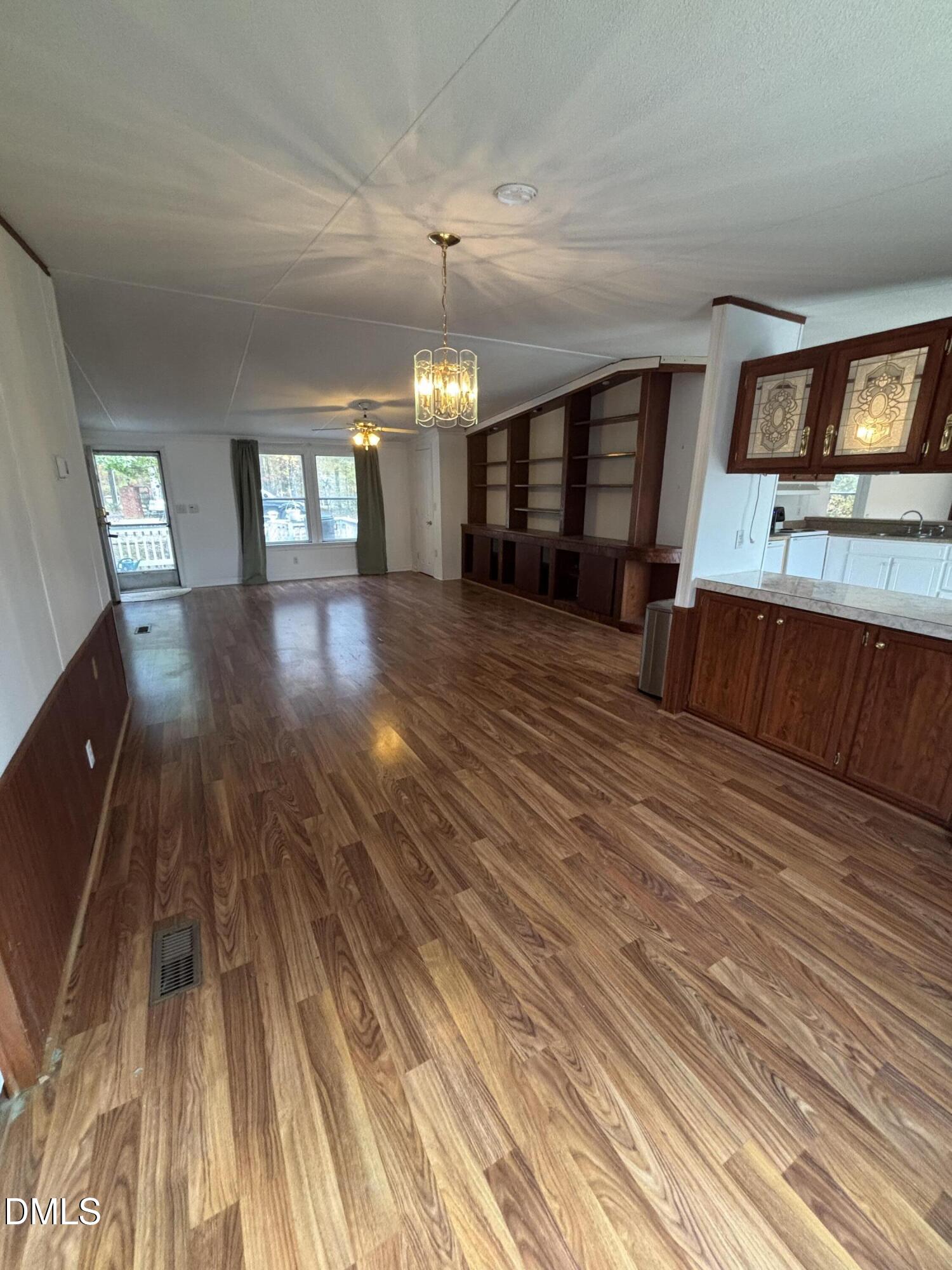 762 Shocco Springs Road Warrenton, NC 27589 - Photo 9 of 24 wooden floor with a window in a room