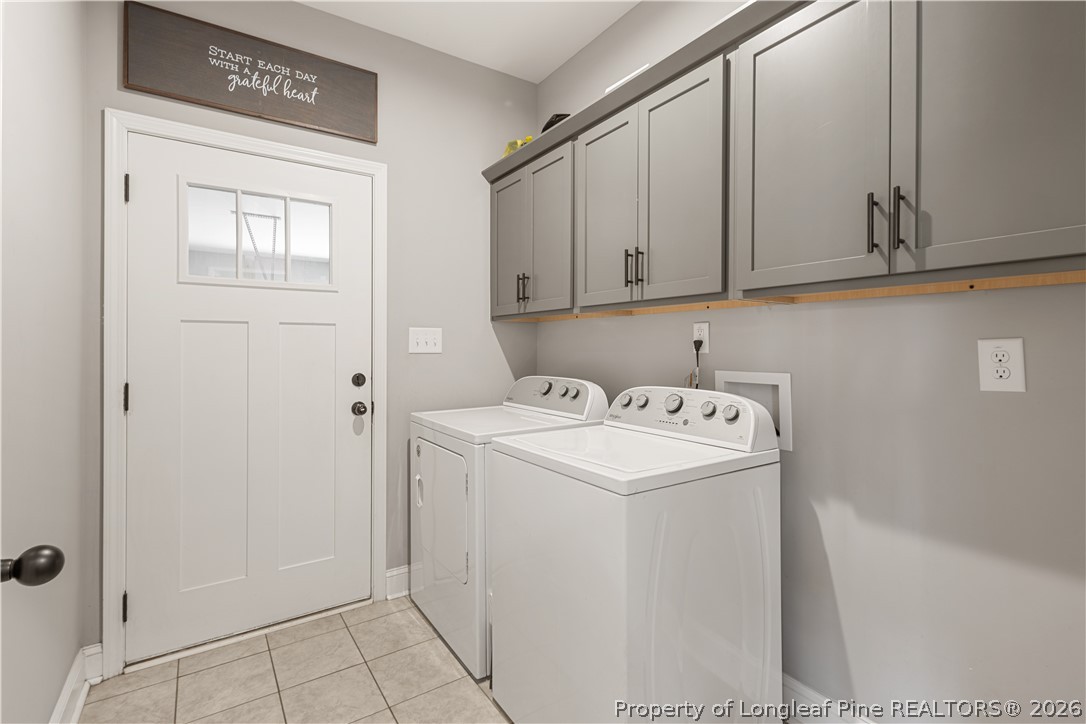 137 Minter School Road Sanford, NC 27332 - Photo 18 of 50 a utility room with dryer and washer