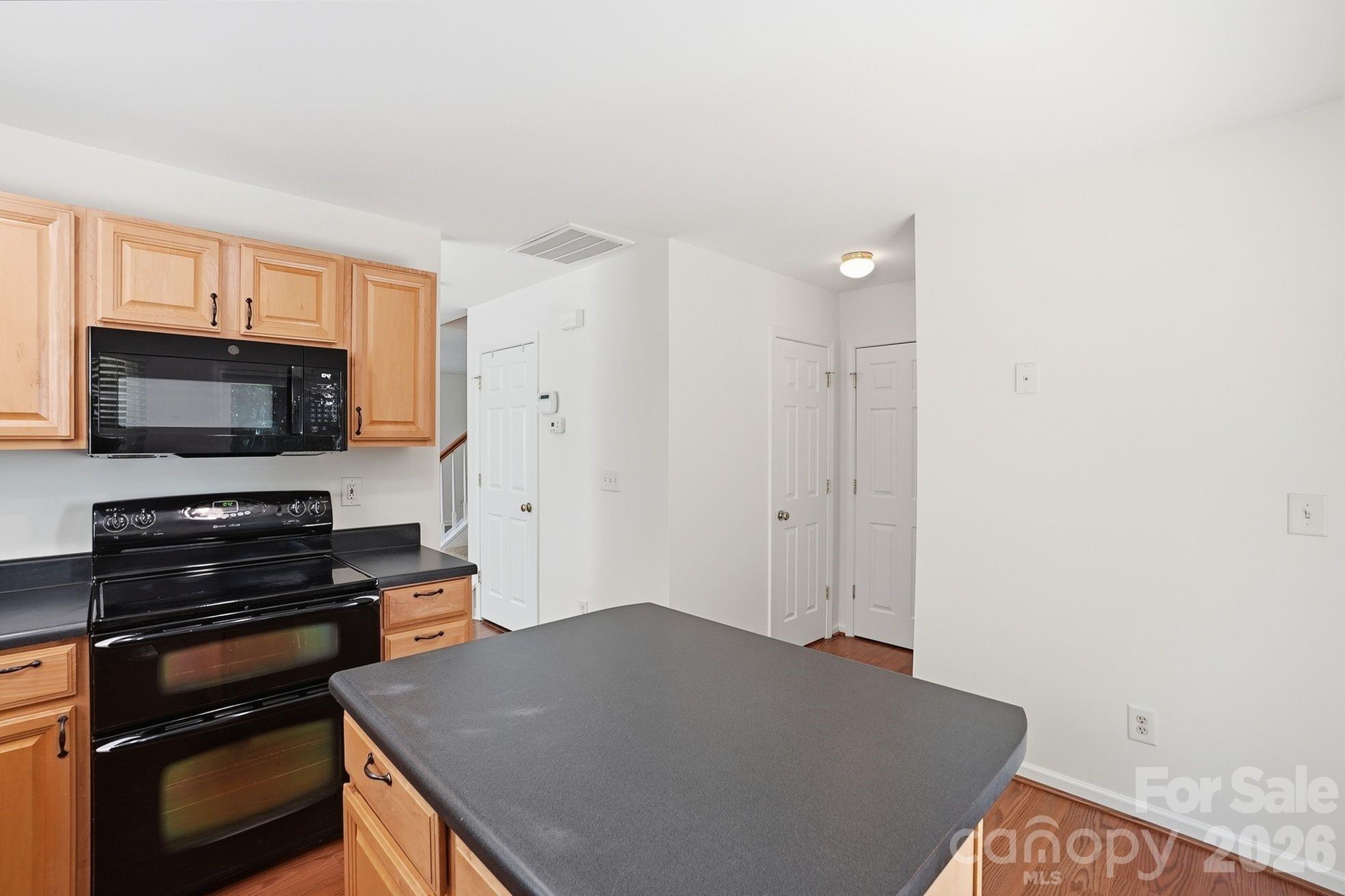 322 Deep Water Lane Fort Mill, SC 29715 - Photo 15 of 29 a kitchen with a stove and a microwave
