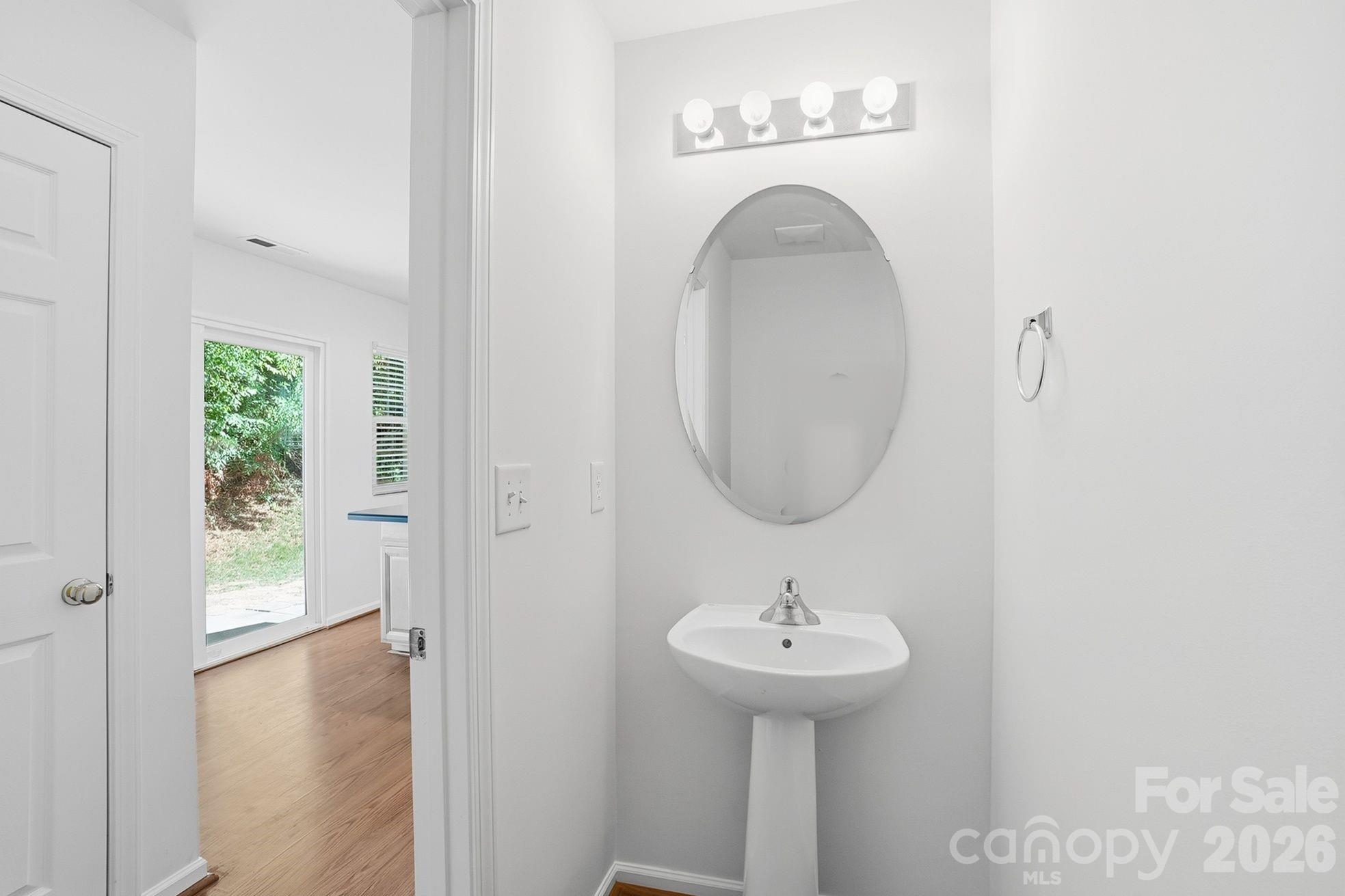 322 Deep Water Lane Fort Mill, SC 29715 - Photo 16 of 29 a bathroom with a sink and a mirror