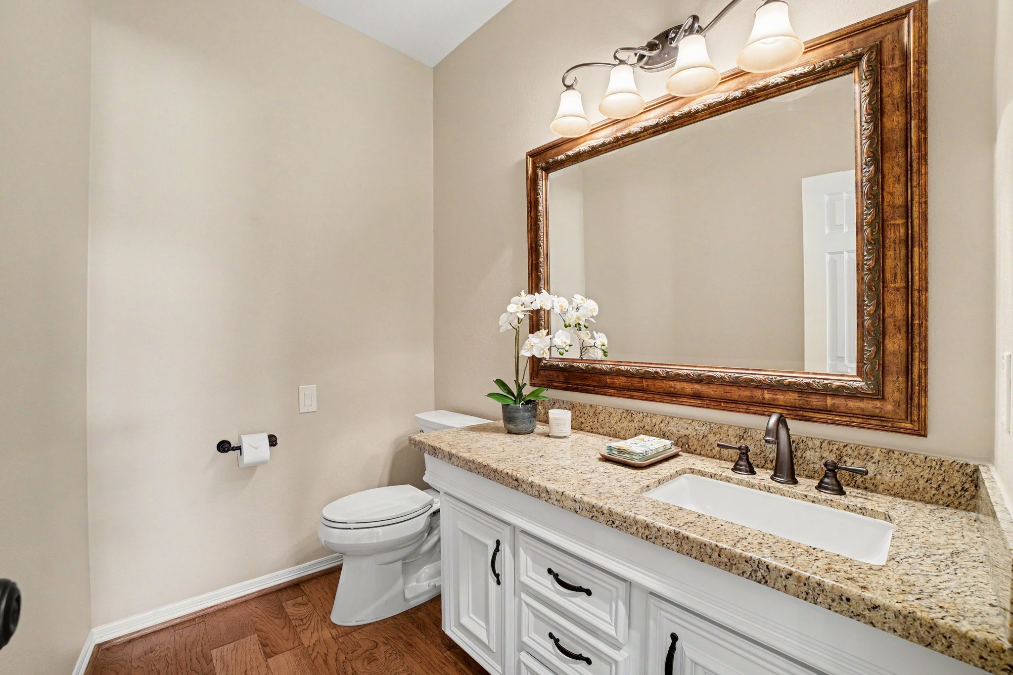 3411 Fir Forest Drive Spring, TX 77388 - Photo 21 of 39 Fully updated half bathroom located off of the grand entryway and living area. Perfect for when guests are visiting.