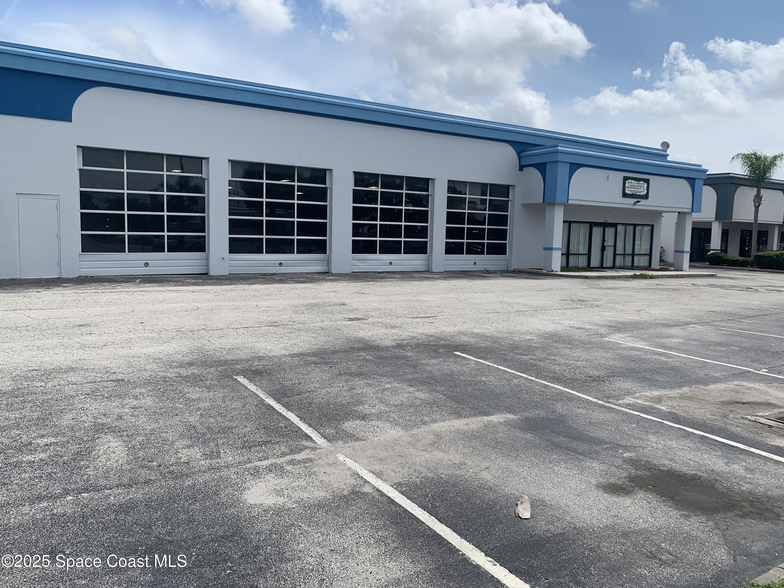 1296 Sarno Road Melbourne, FL 32935 - Photo 1 of 5 View From SW Corner