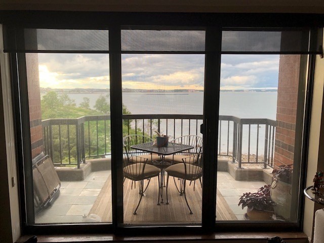 3 Seal Harbor Road, Unit 632 Winthrop, MA 02152 - Photo 13 of 34 a view of a room with wooden floor and floor to ceiling window