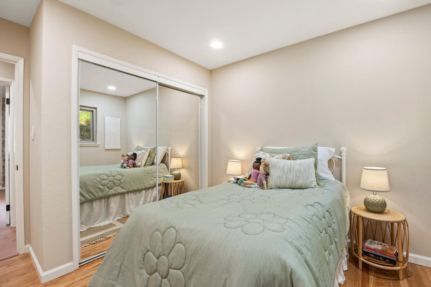5152 Felter Road San Jose, CA 95132 - Photo 16 of 43 a bedroom with a bed and a large mirror