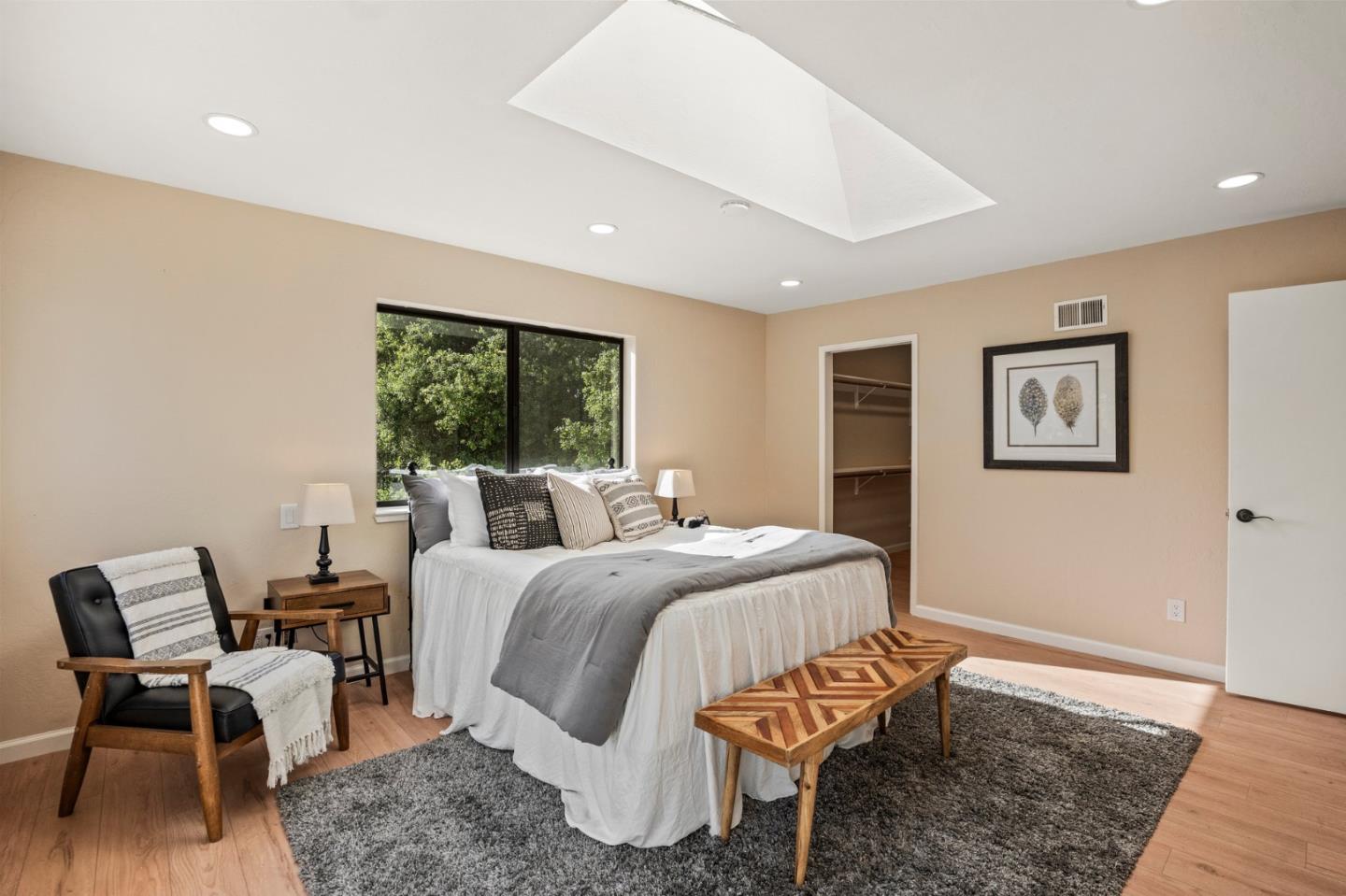 5152 Felter Road San Jose, CA 95132 - Photo 29 of 43 a bedroom with a bed a large window and chair