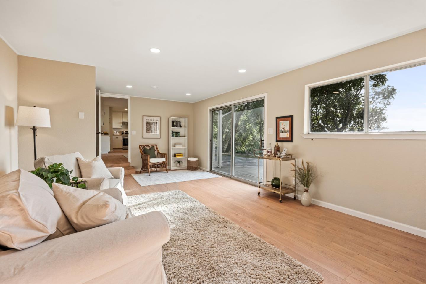 5152 Felter Road San Jose, CA 95132 - Photo 5 of 43 a living room with furniture gym equipment and a large window