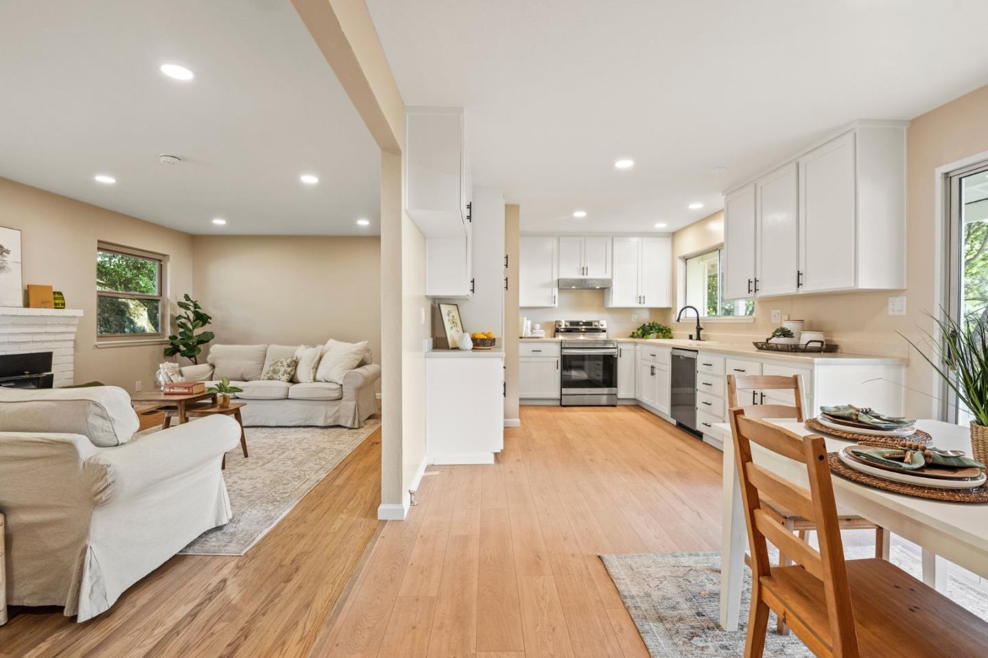 5152 Felter Road San Jose, CA 95132 - Photo 8 of 43 a living room with stainless steel appliances furniture cabinets and a wooden floor