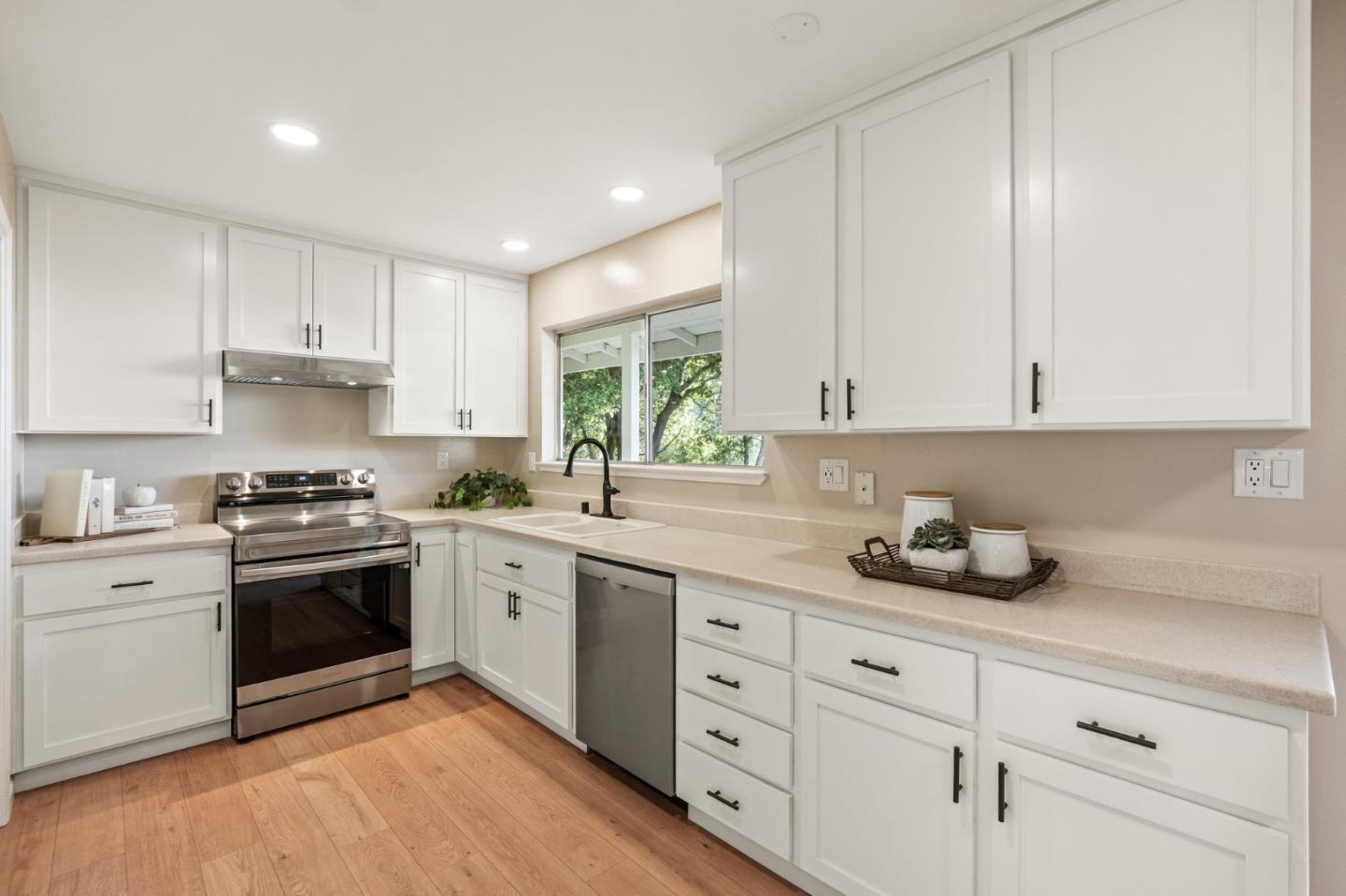 5152 Felter Road San Jose, CA 95132 - Photo 9 of 43 a kitchen with cabinets appliances and a window