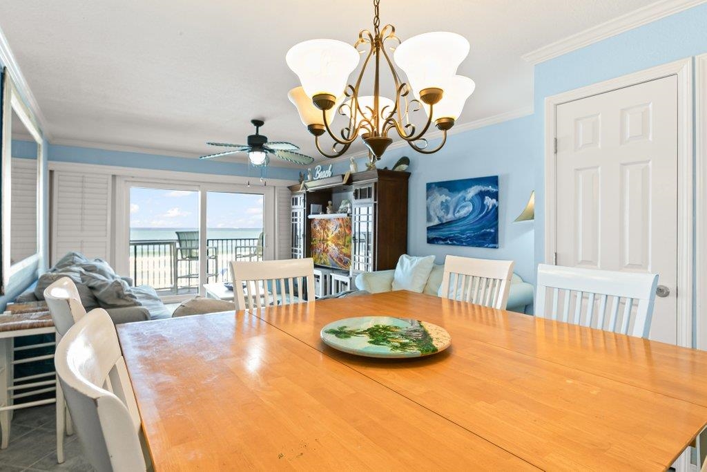 8550 A1A South, Unit 208 St. Augustine, FL 32080 - Photo 15 of 56 a view of a dining room with furniture