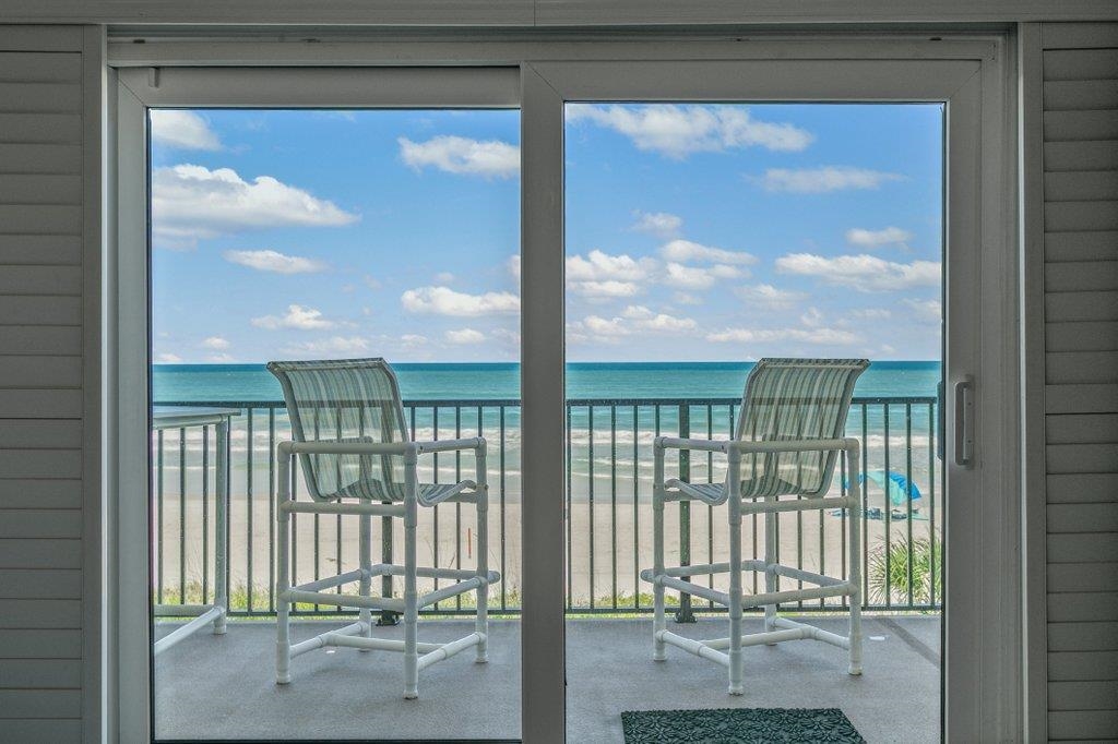 8550 A1A South, Unit 208 St. Augustine, FL 32080 - Photo 21 of 56 a view of a glass door
