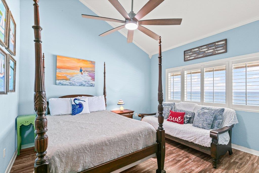 8550 A1A South, Unit 208 St. Augustine, FL 32080 - Photo 3 of 56 a bedroom with furniture and a large window