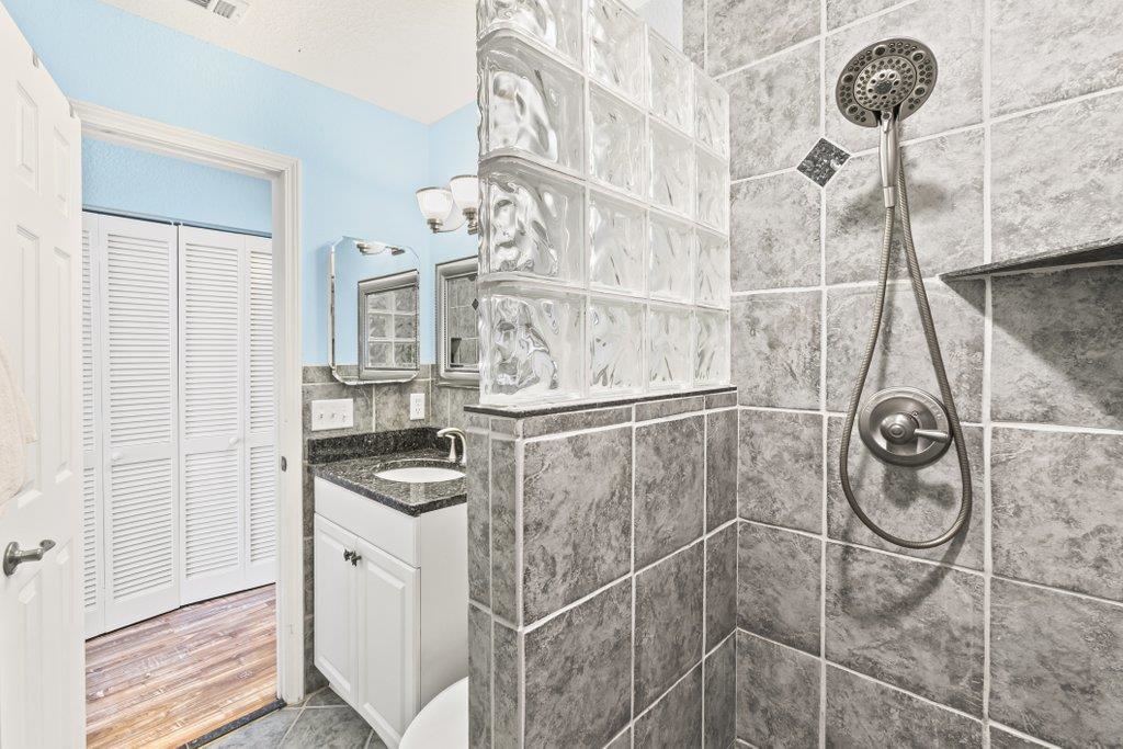 8550 A1A South, Unit 208 St. Augustine, FL 32080 - Photo 35 of 56 a kitchen with a sink and cabinets
