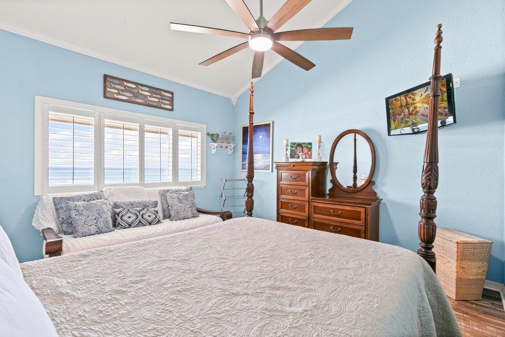 8550 A1A South, Unit 208 St. Augustine, FL 32080 - Photo 6 of 56 a bedroom with a large bed and a window