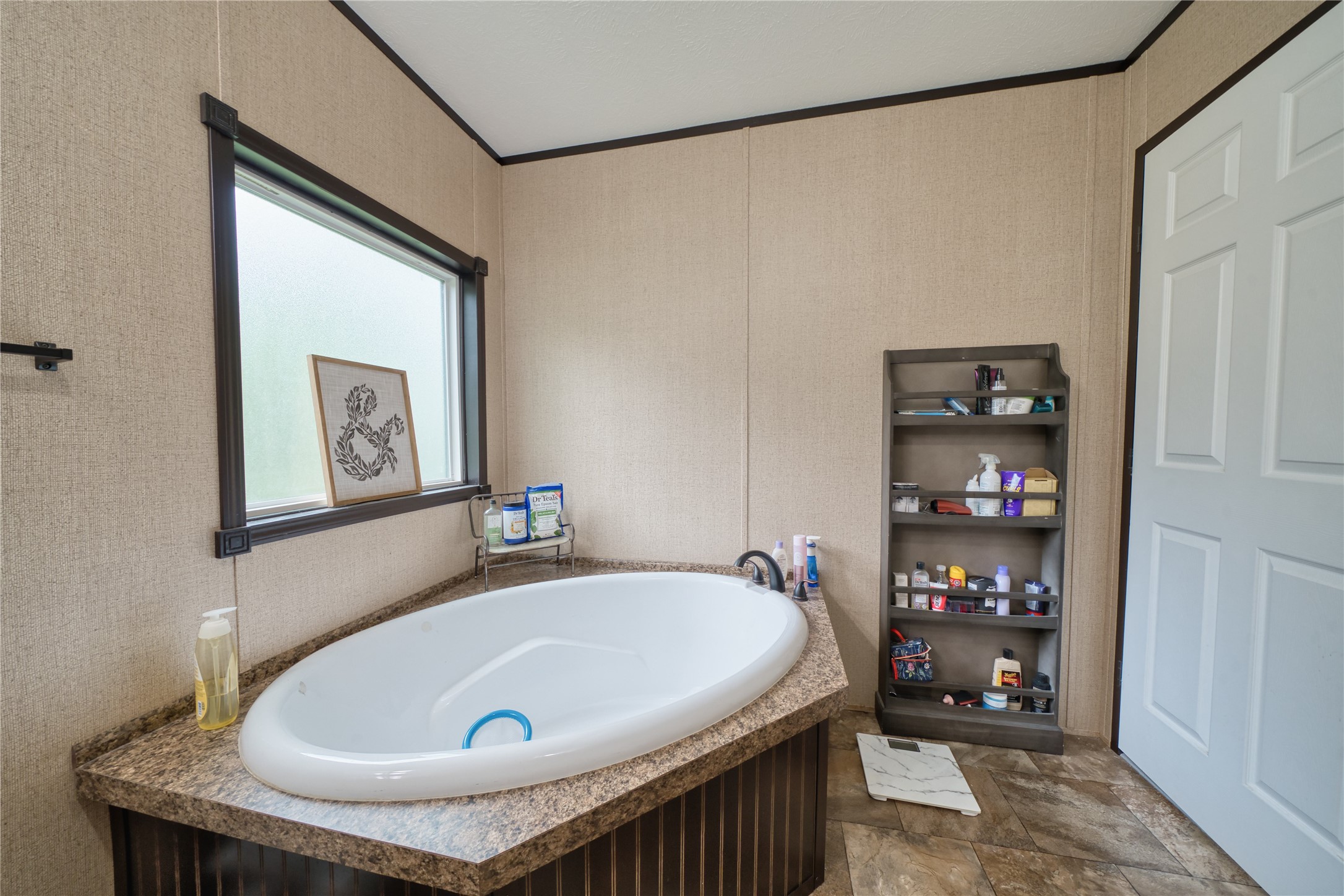 103 County Road 370 Splendora, TX 77372 - Photo 24 of 32 a bathroom with a tub and shower