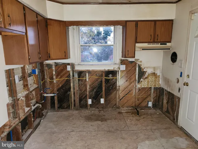 a view of storage and utility room