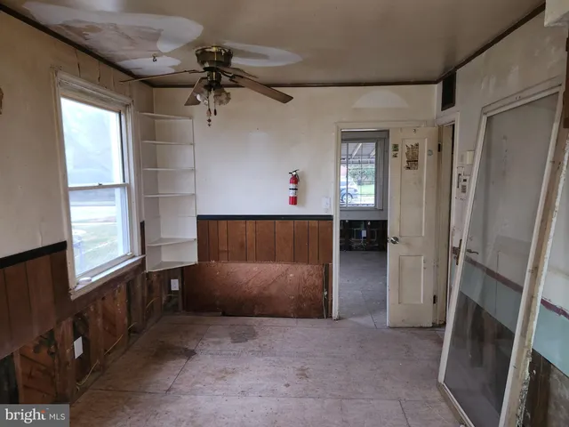 an empty room with windows