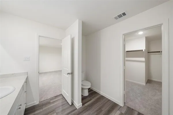 a bathroom with a sink and a toilet