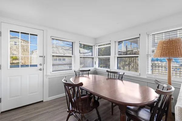 a kitchen with a refrigerator and a stove