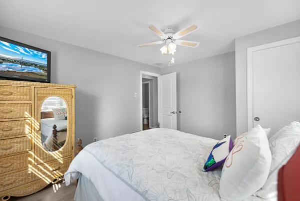 a bedroom with furniture and a window