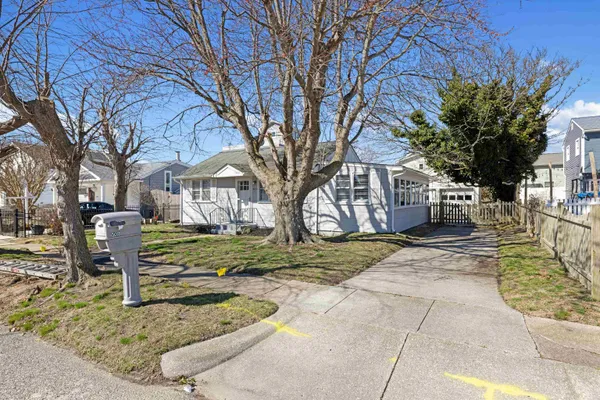 a view of a house with snow on the wall