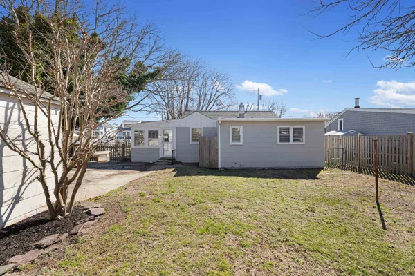 a view of a house with a street