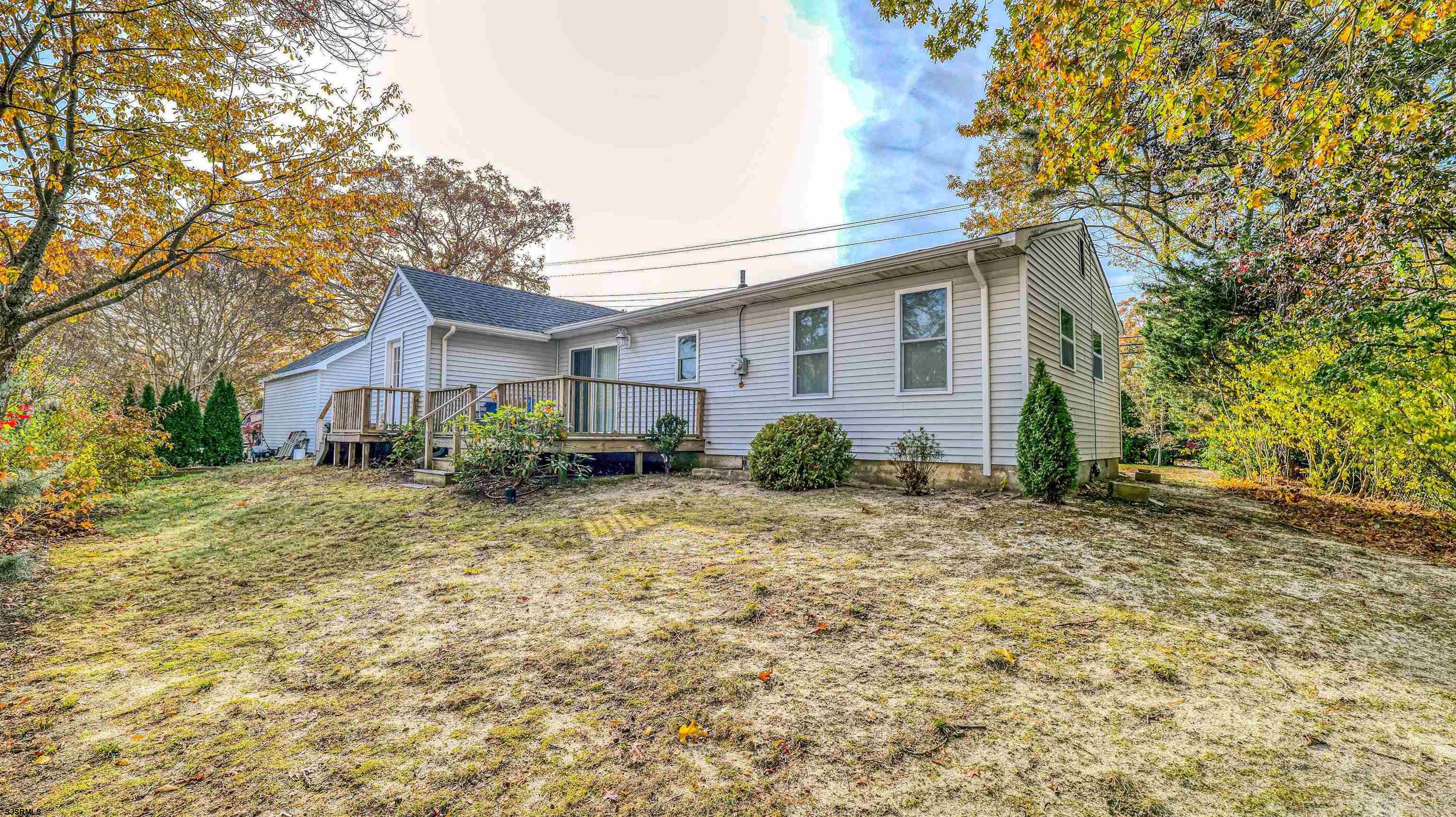 906 New Road Somers Point, NJ 08244 - Photo 11 of 32 a view of a house with yard and plants
