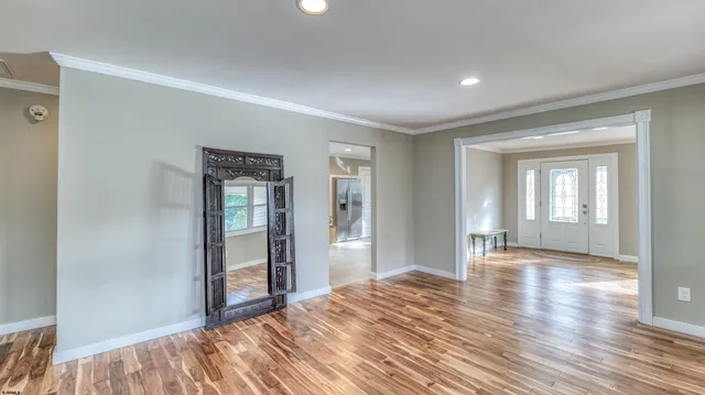 a view of an empty room and window
